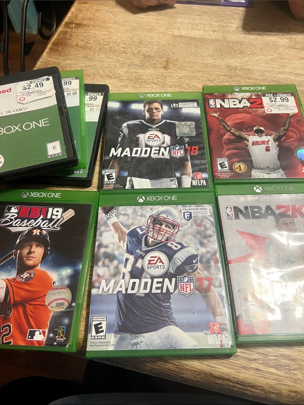 Bundle of 8. Games including Madden NFL 17 - Xbox One - Green Case
